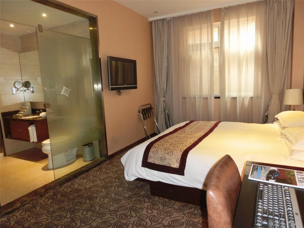 Shanghai Baron Business Bund Hotel Habitación foto